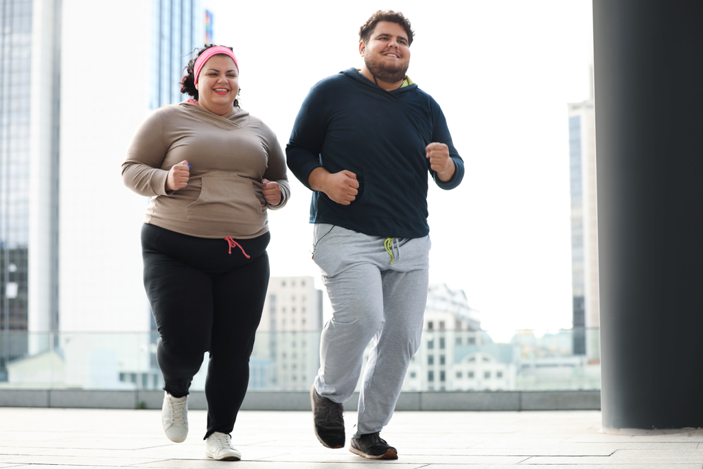 two runners getting back into running