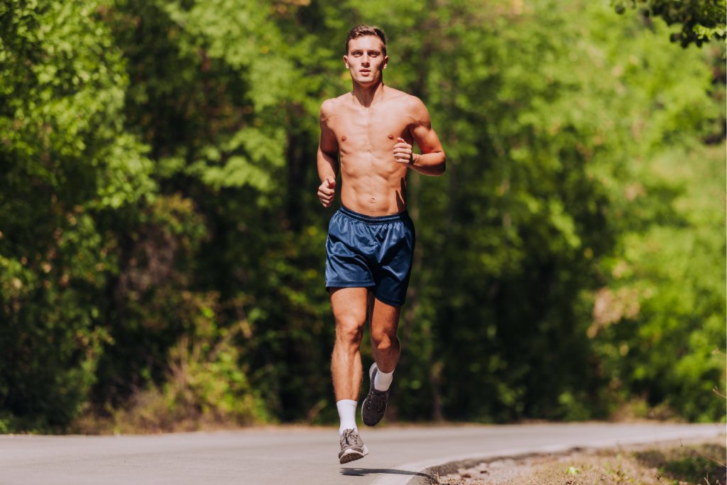 man with well defined muscles running